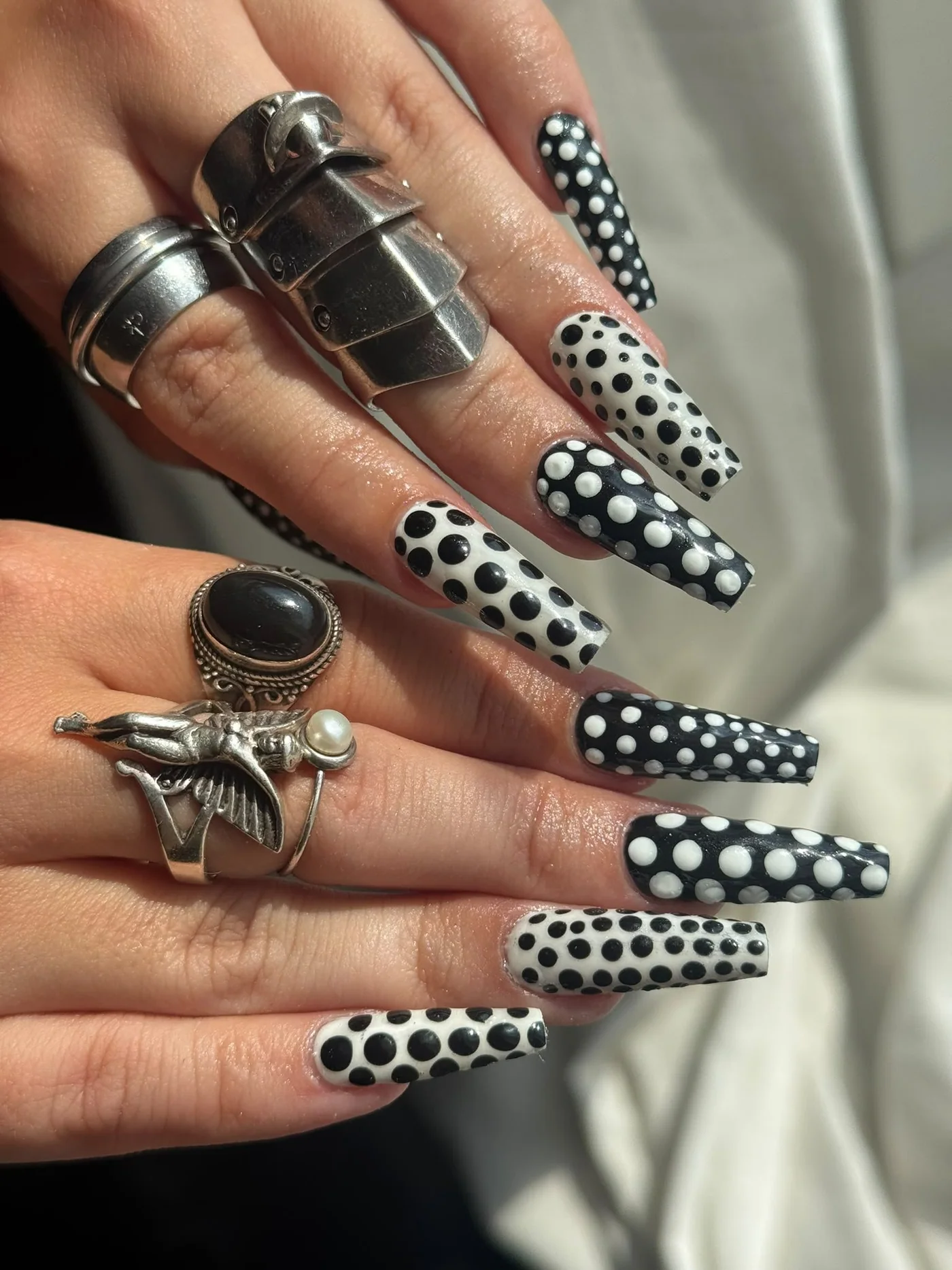 Black and white polka dot nails
