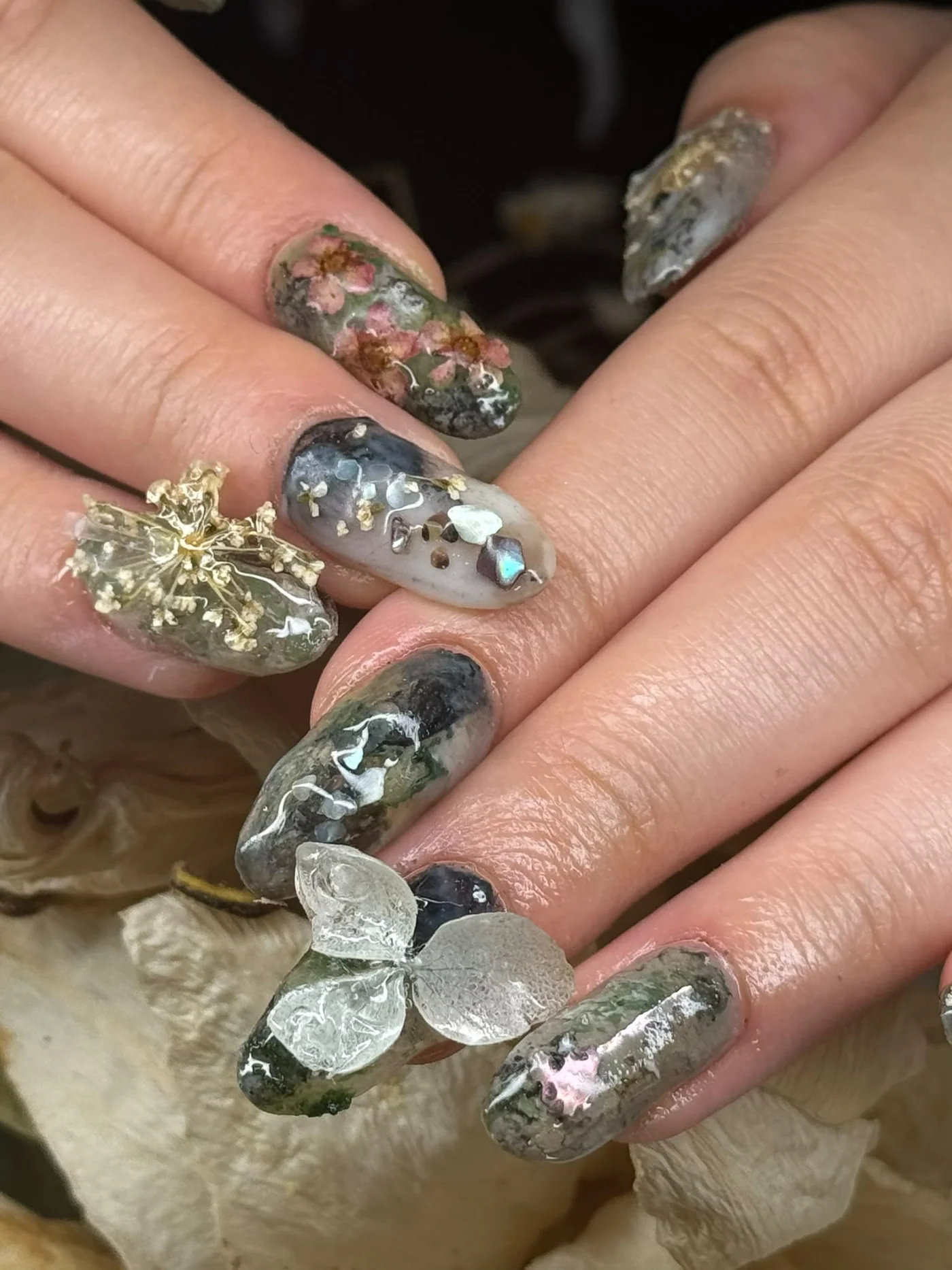Glass and chrome sculptural nails